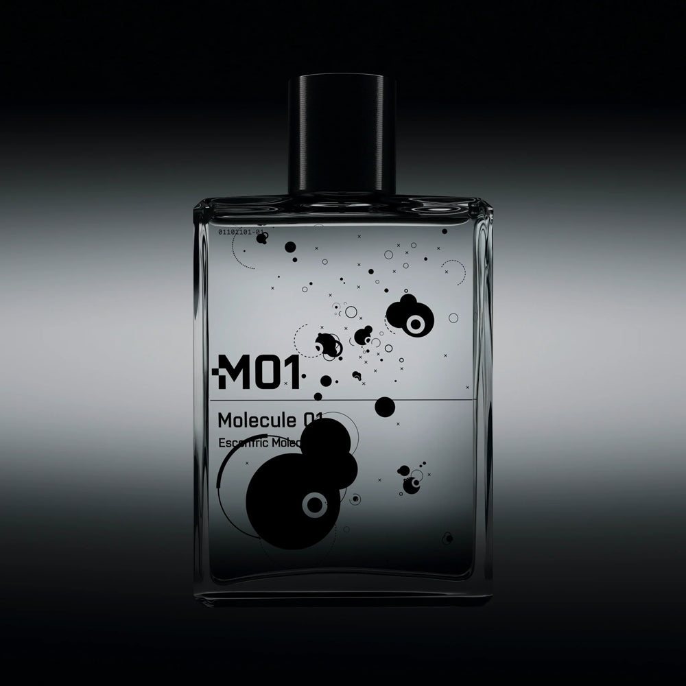 Two bottles of Escentric Molecules shot with a playful shadow effect.