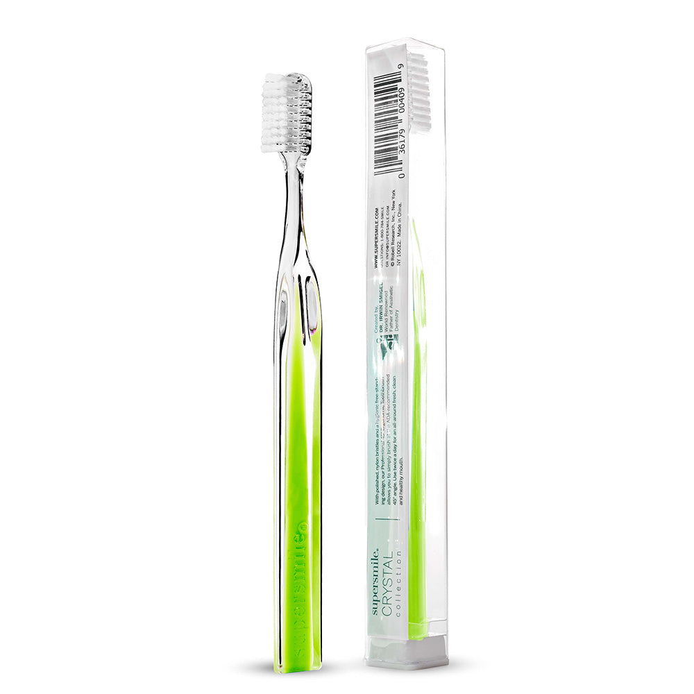 Supersmile Green toothbrush with packaging on a white background