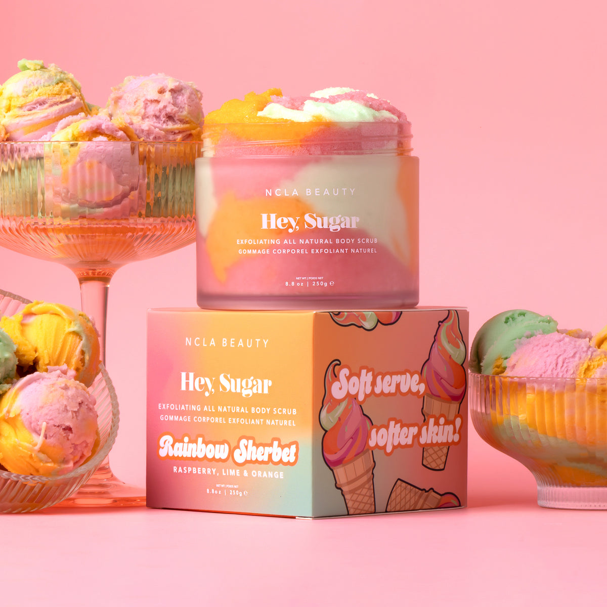 NCLA Beauty 'Hey Sugar' body scrub with packaging on a pink background