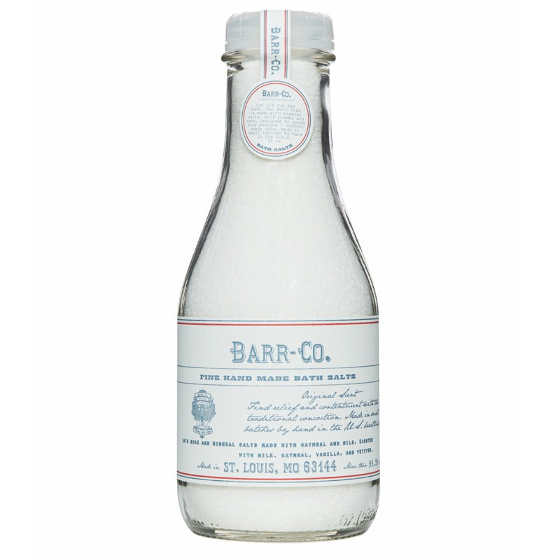 A clear glass bottle with a label reading 'BARR-Co.' and 'Fine Hand-Made Bath Salts.