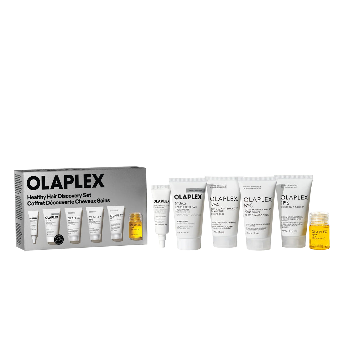 Olaplex Healthy Hair Discovery Set containing a gray gift box, several white hair care tubes, a small white bottle, and a small amber oil bottle on a plain white background.