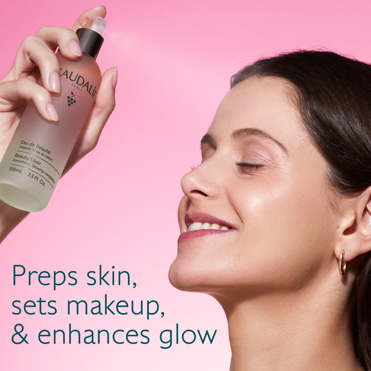 Woman holding a bottle of skincare product with text on a pink background