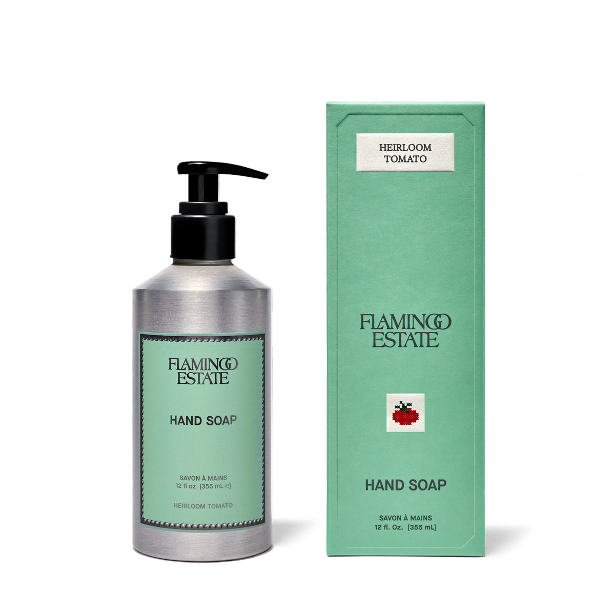 Flamingo Estate Heibloom Tomato hand soap bottle next to its mint green packaging box on a white background.