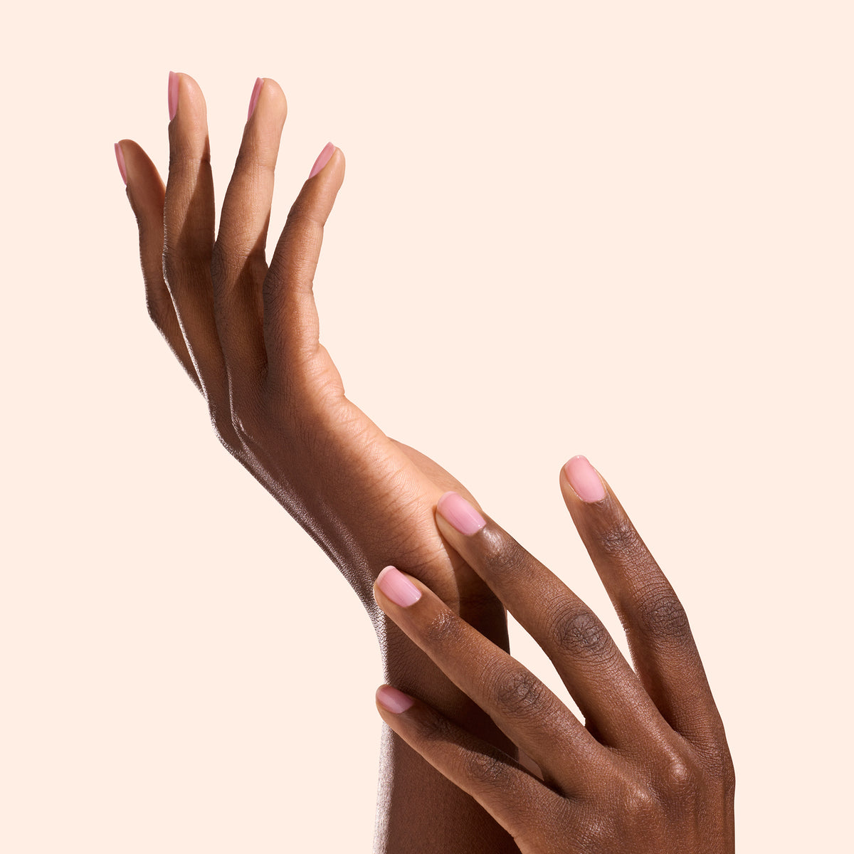 Active Glow on dark shade hand on pink background 