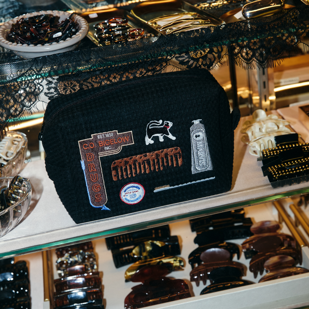 Abbode x C.O. Bigelow Apothecary Waffle Pouch on a display of hair accessories