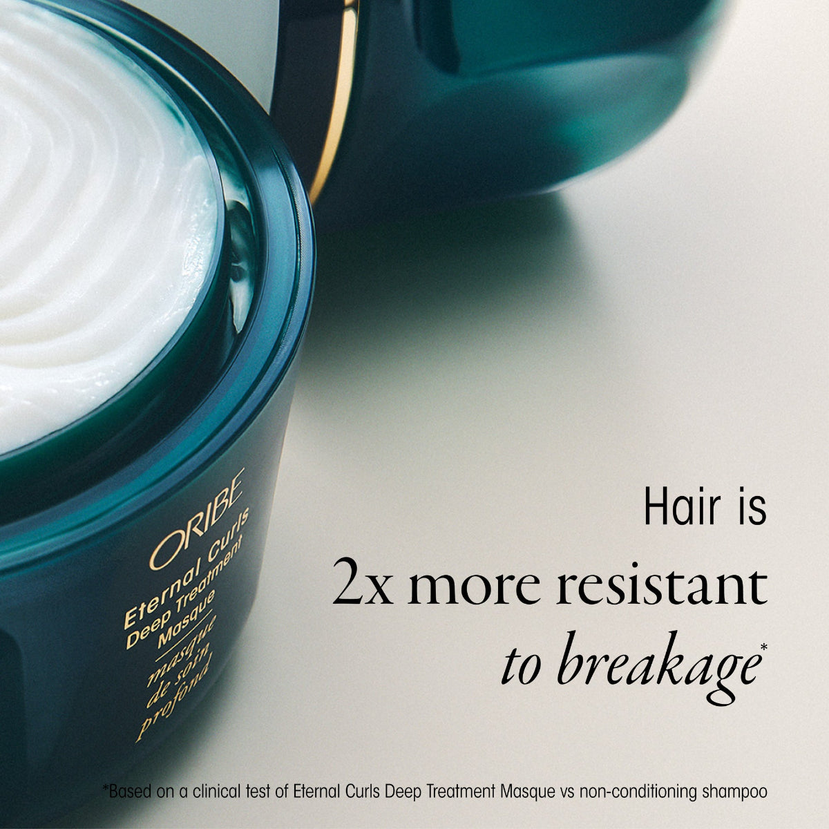 Oribe Eternal Curls Deep Treatment Masque jar with text about hair resistance to breakage on a light background