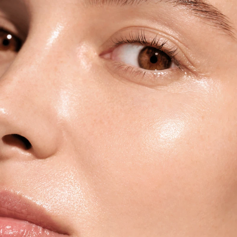 Close up of models skin showing effects of Augustinus Bader Hydrogel Mask.