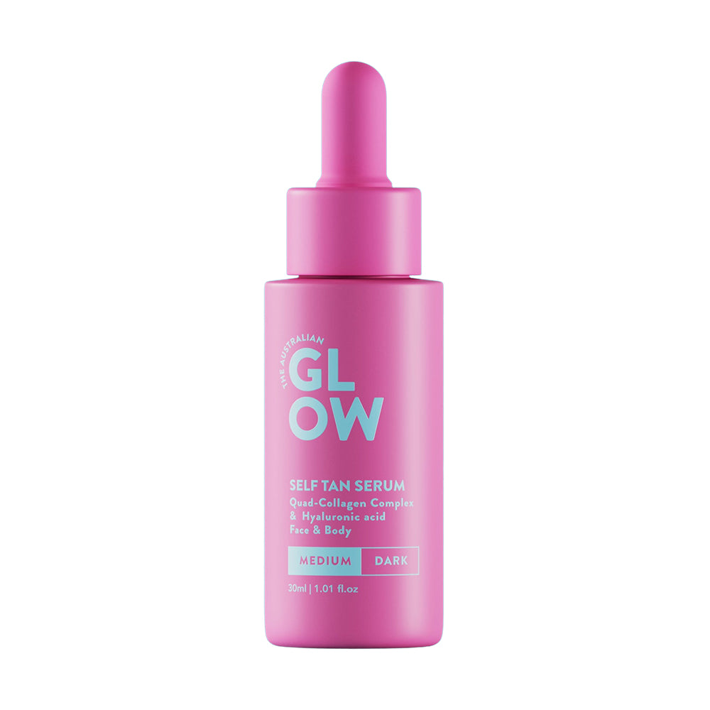 A pink bottle with a dropper cap for Australian Glow Hydrating Tanning Drops, Self-Tanning Serum with Kakadu Plum, in medium to dark shade.