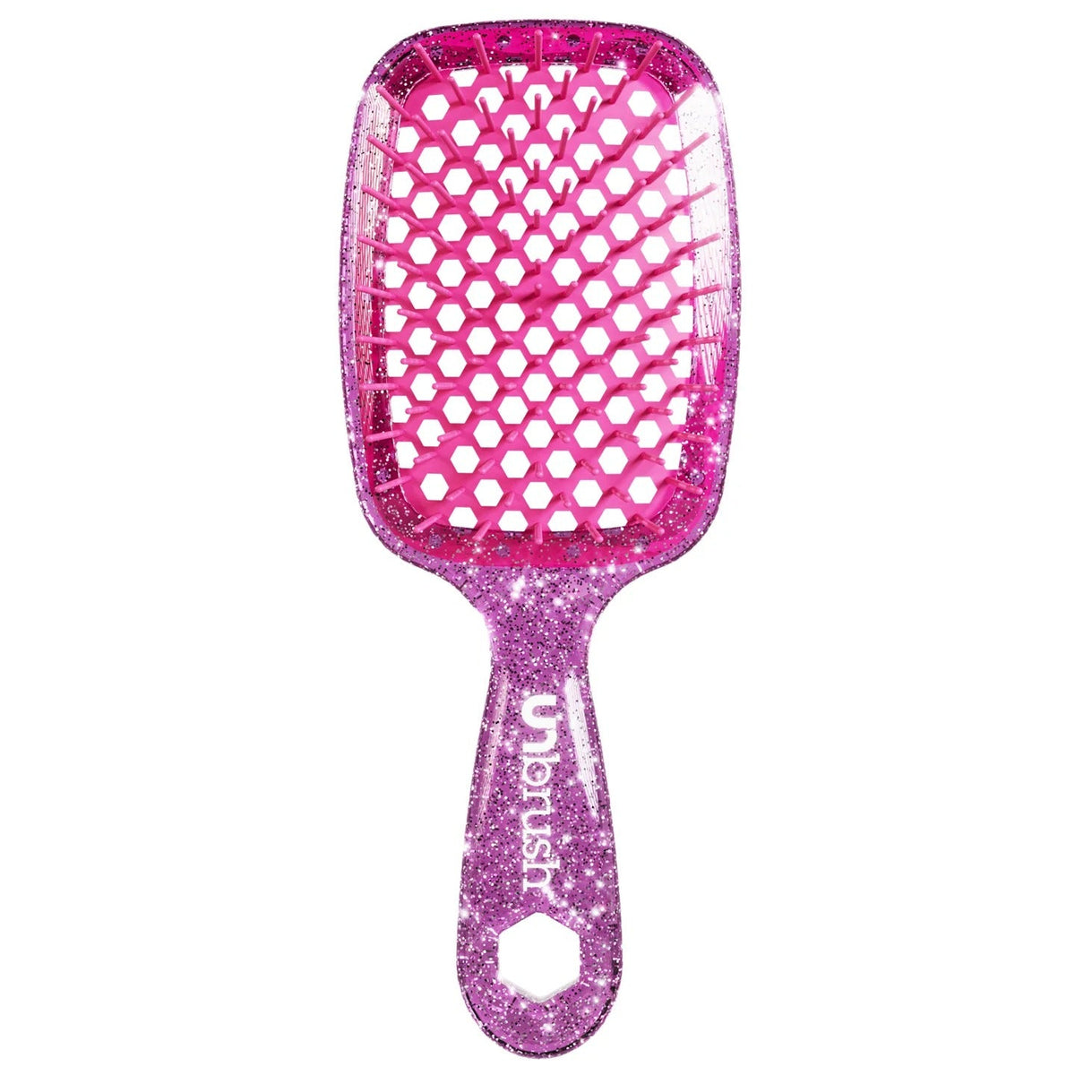 Pink glittery hairbrush on a white background