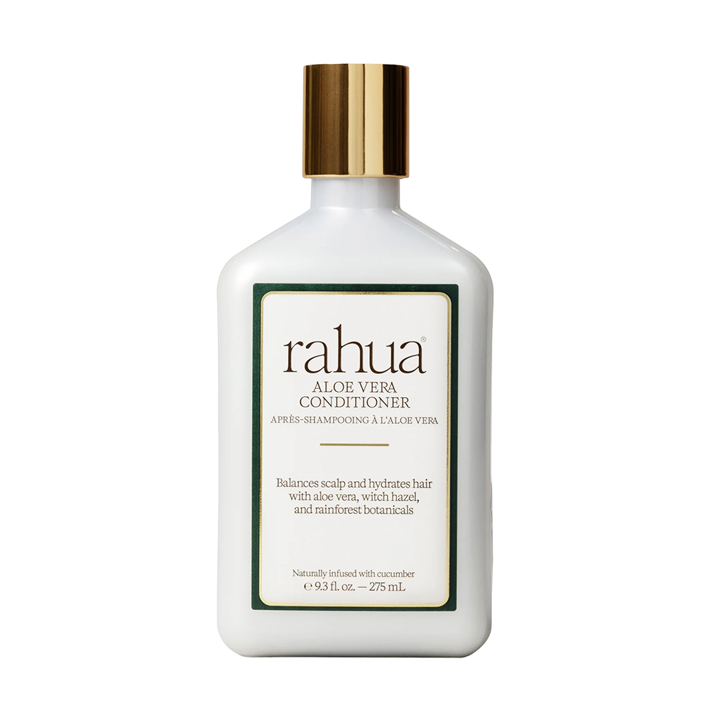 A white bottle of Rahua Aloe Vera Conditioner with a metallic gold cap and a cream-colored label, shown on a solid white background.