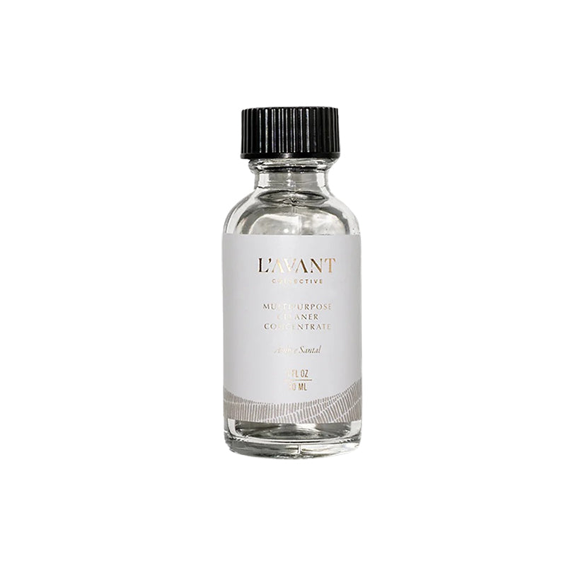 Clear bottle with black cap and white label on a white background