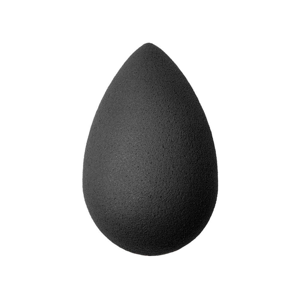 Black makeup sponge on a white background