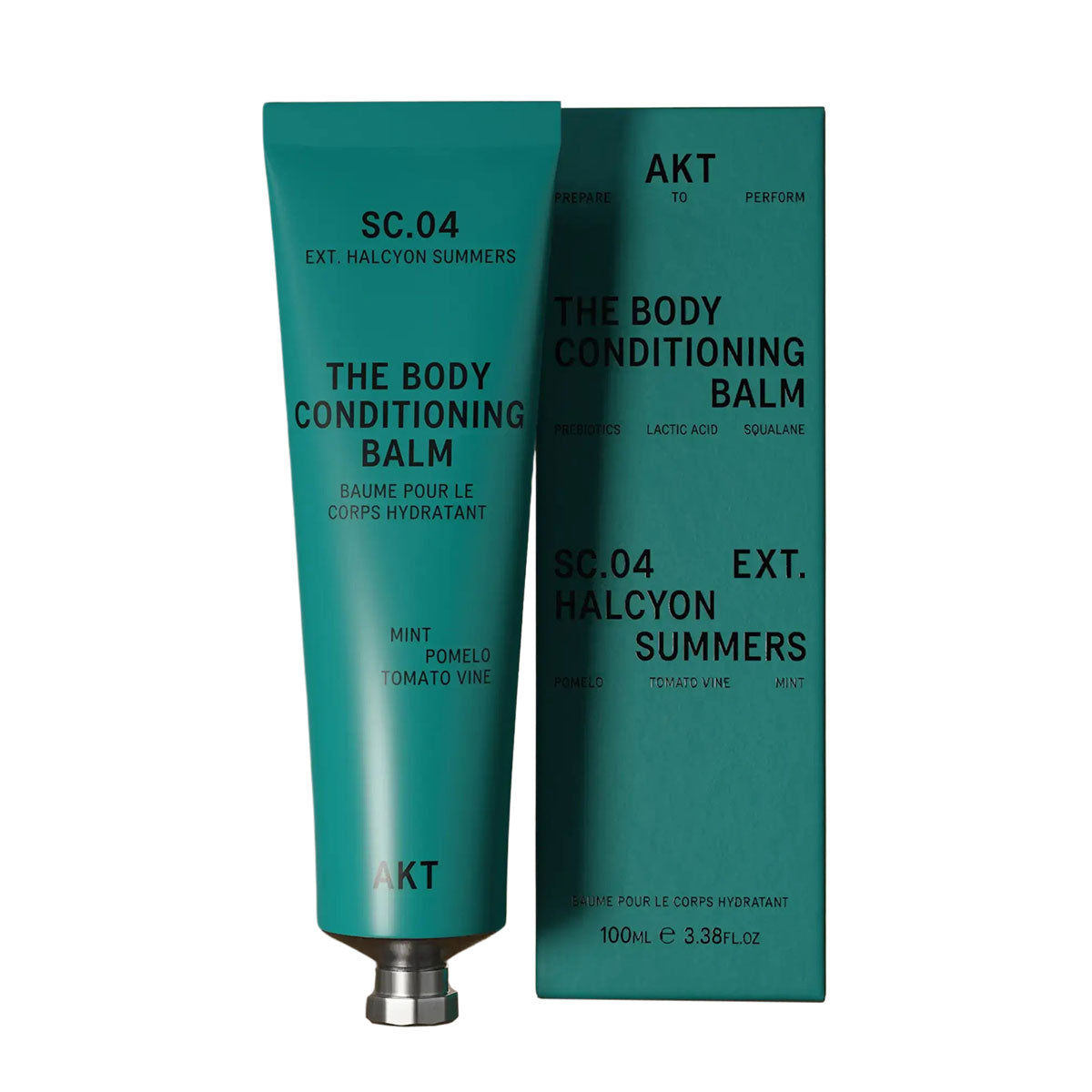 AKT's Halcyon Summers Body Conditioning Balm tube to the left of it's teal packaging box in front of a white background.