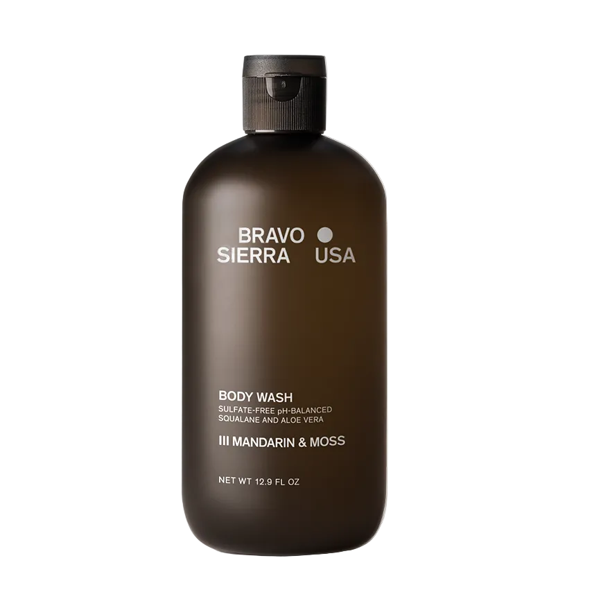 Brown body wash bottle with 'Bravo Sierra USA' branding on a gray background