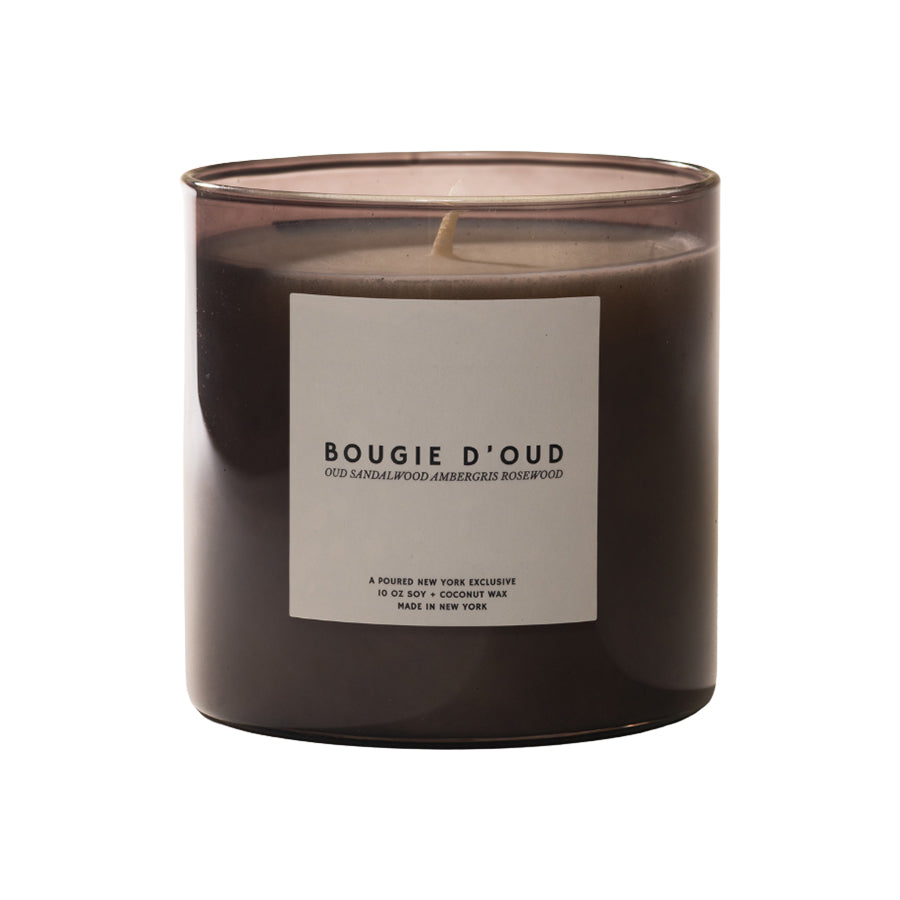 Bougie D'Oud candle with a label on a white background