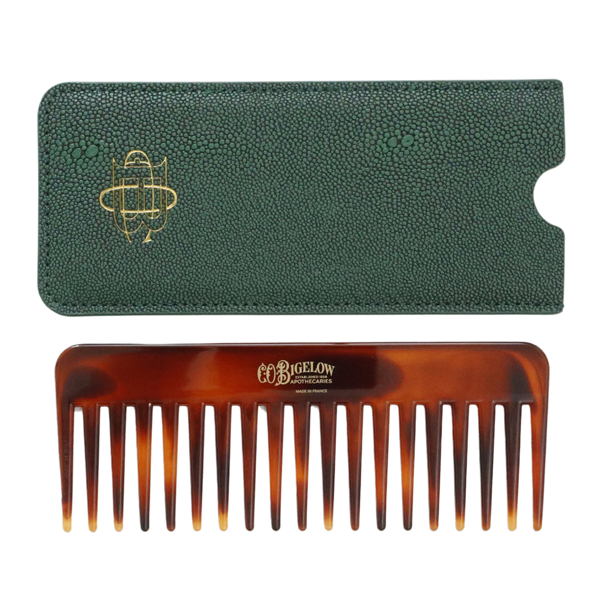 A Bigelow hair comb with a tortoiseshell pattern, shown with its dark green textured leather case featuring a gold logo, on a plain white background.