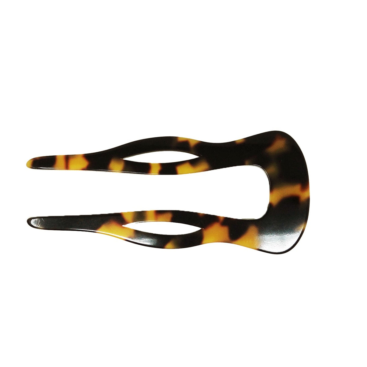 Tortoiseshell hair clip on a white background
