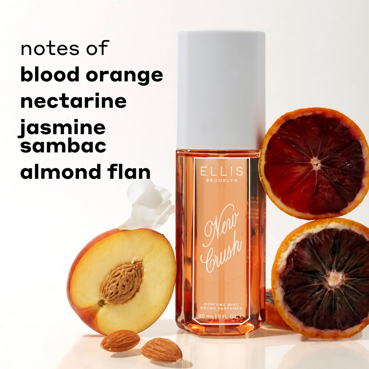 Perfume bottle with dried fruits and nuts on a white background