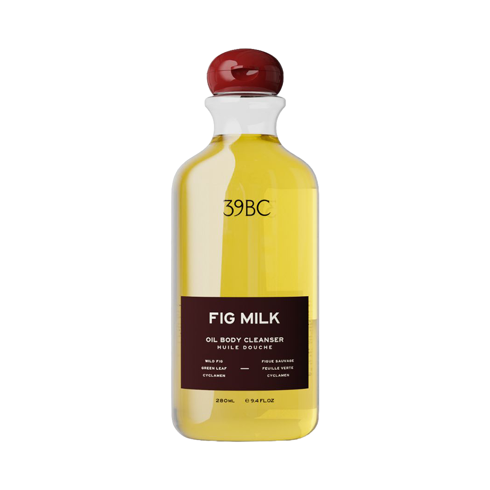 Bottle of 39BC Fig Milk Oil Body Cleanser filled with yellow oil, featuring a dark brown label and a dark red cap, set against a plain white background.