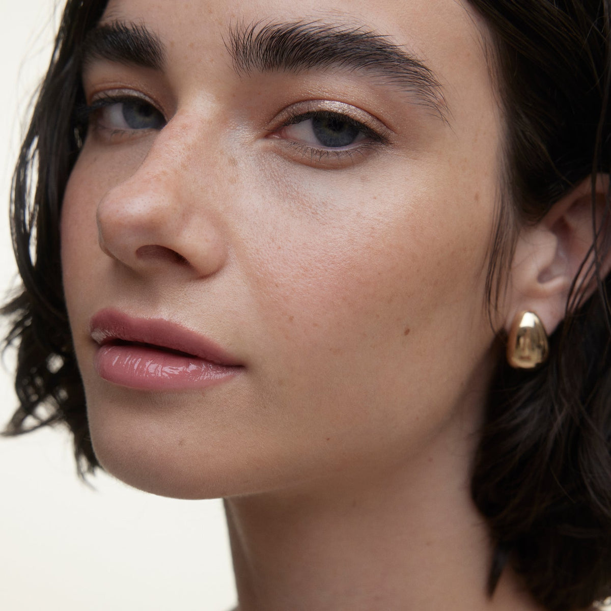 Closeup of woman's face wearing Wonderblush makeup.