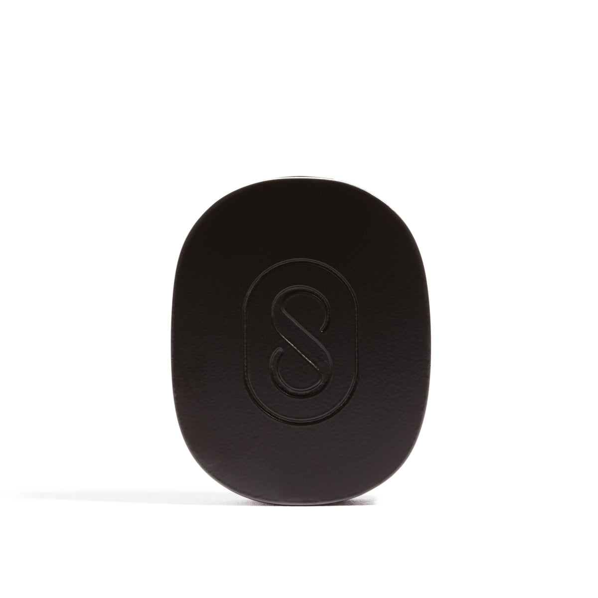 Midas Solid Perfume in a black case on a white background