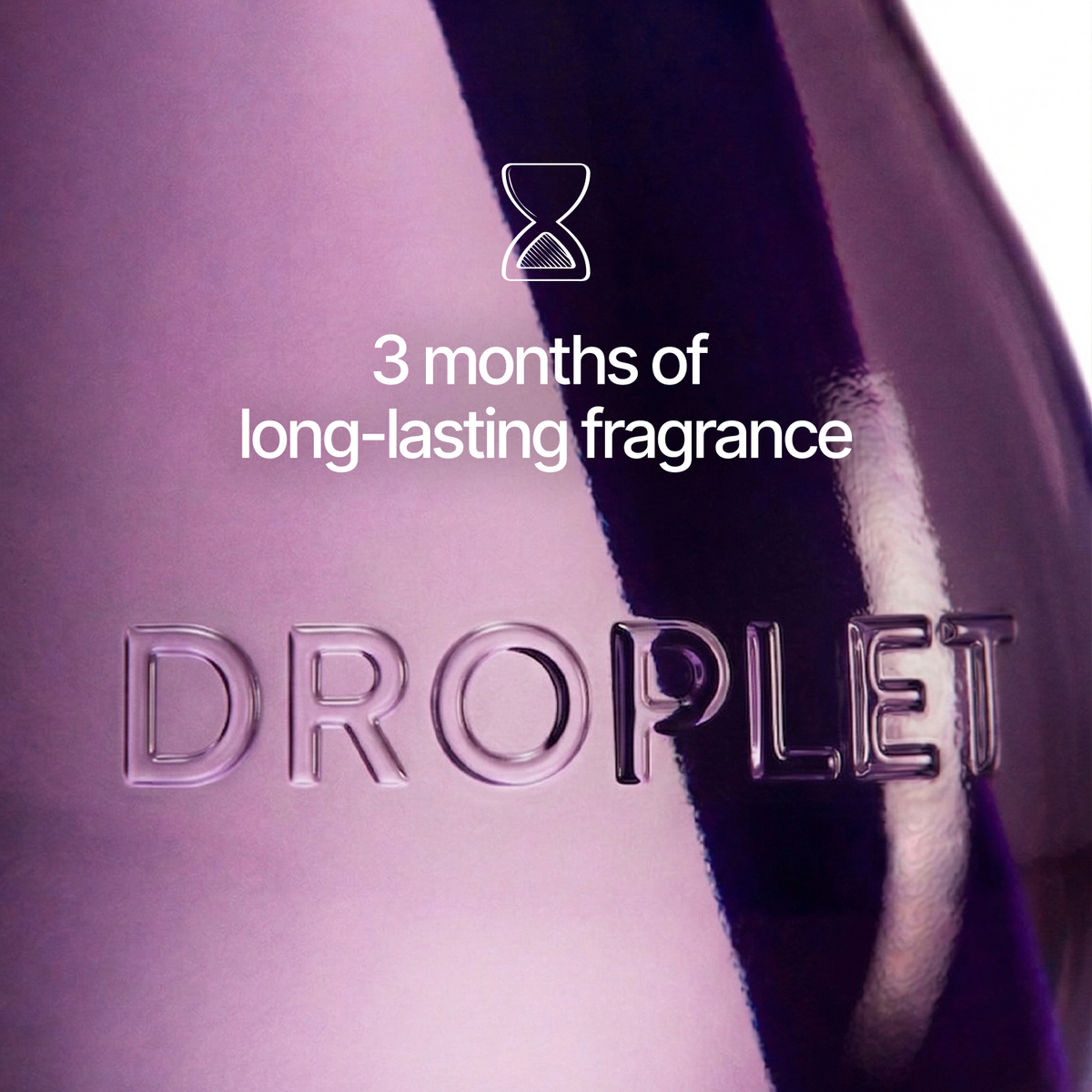 A close-up of a purple dropper bottle with the brand name 'DROPLET' embossed on the front and white text reading '3 months of long-lasting fragrance' with an hourglass icon above it.