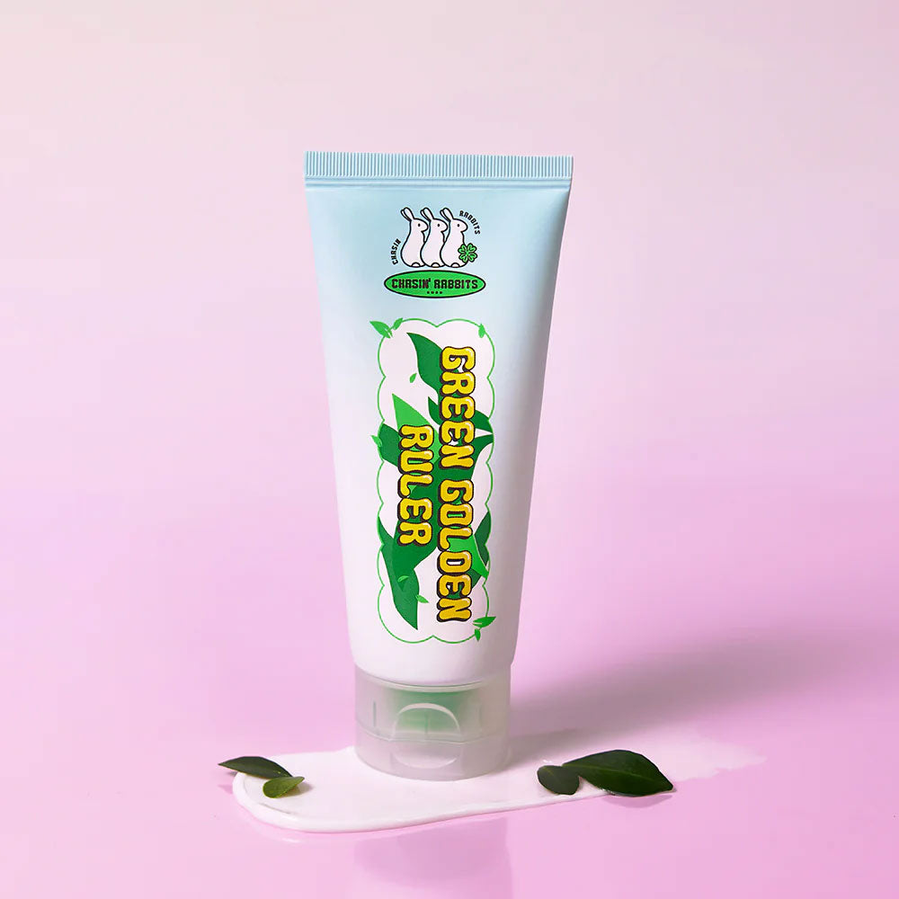Tube of 'Green Golden Ruler' cream with a light blue label on a pink background