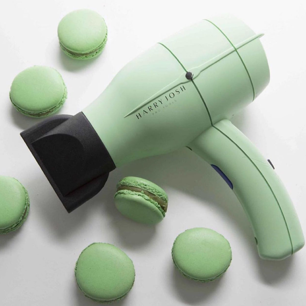 Harry Josh Professional Hair Dryer and green macaroons.