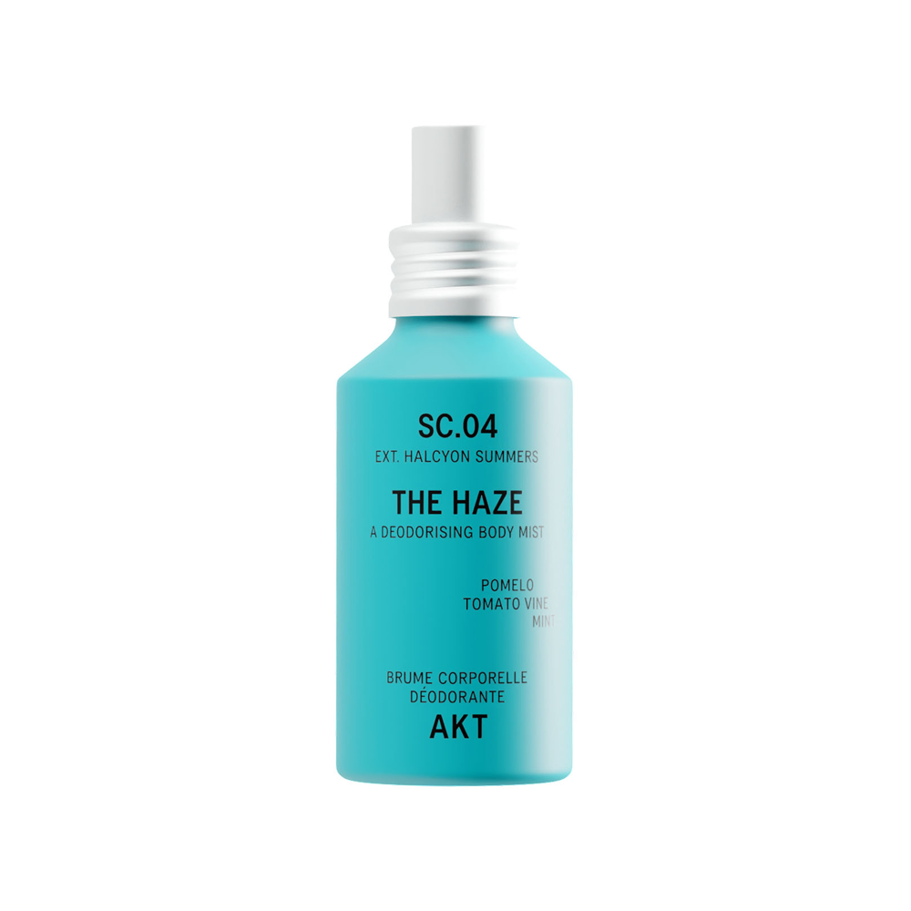 Bottle of AKT The Haze SC. 04 Halcyon Summers with a white spray nozzle, centered on a plain white background.