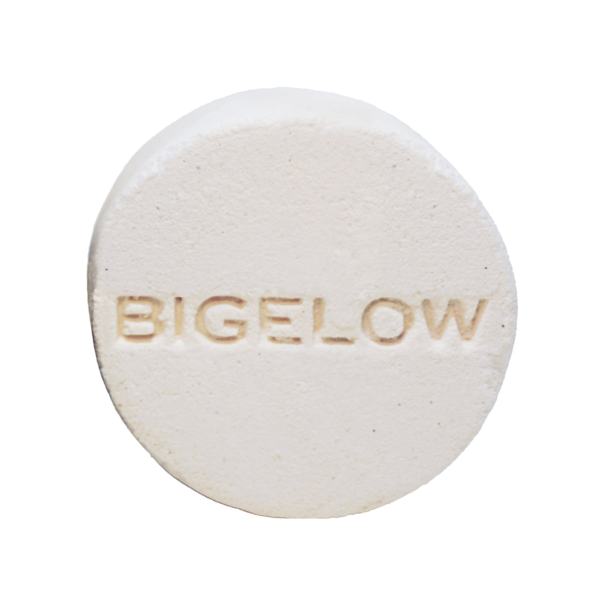Herbal Comfort Shower Steamer Tablet with 'BIGELOW' engraved on a white background.