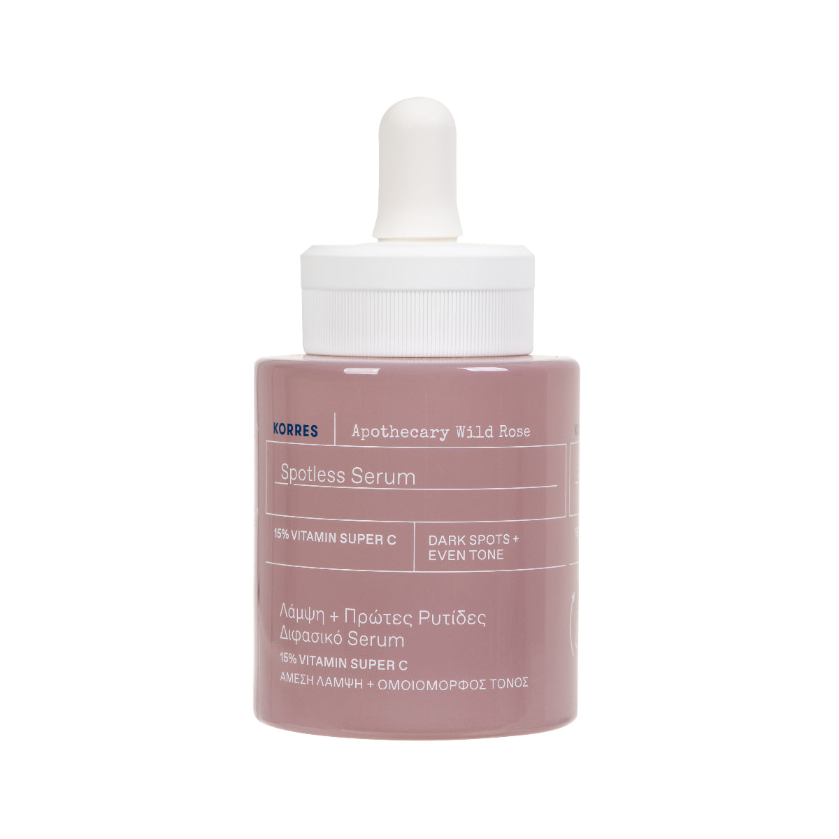 A bottle of Korres Spotless Serum in 'Apothecary Wild Rose' scent, featuring a dusty rose-colored bottle and a white dropper cap, set against a plain white background.