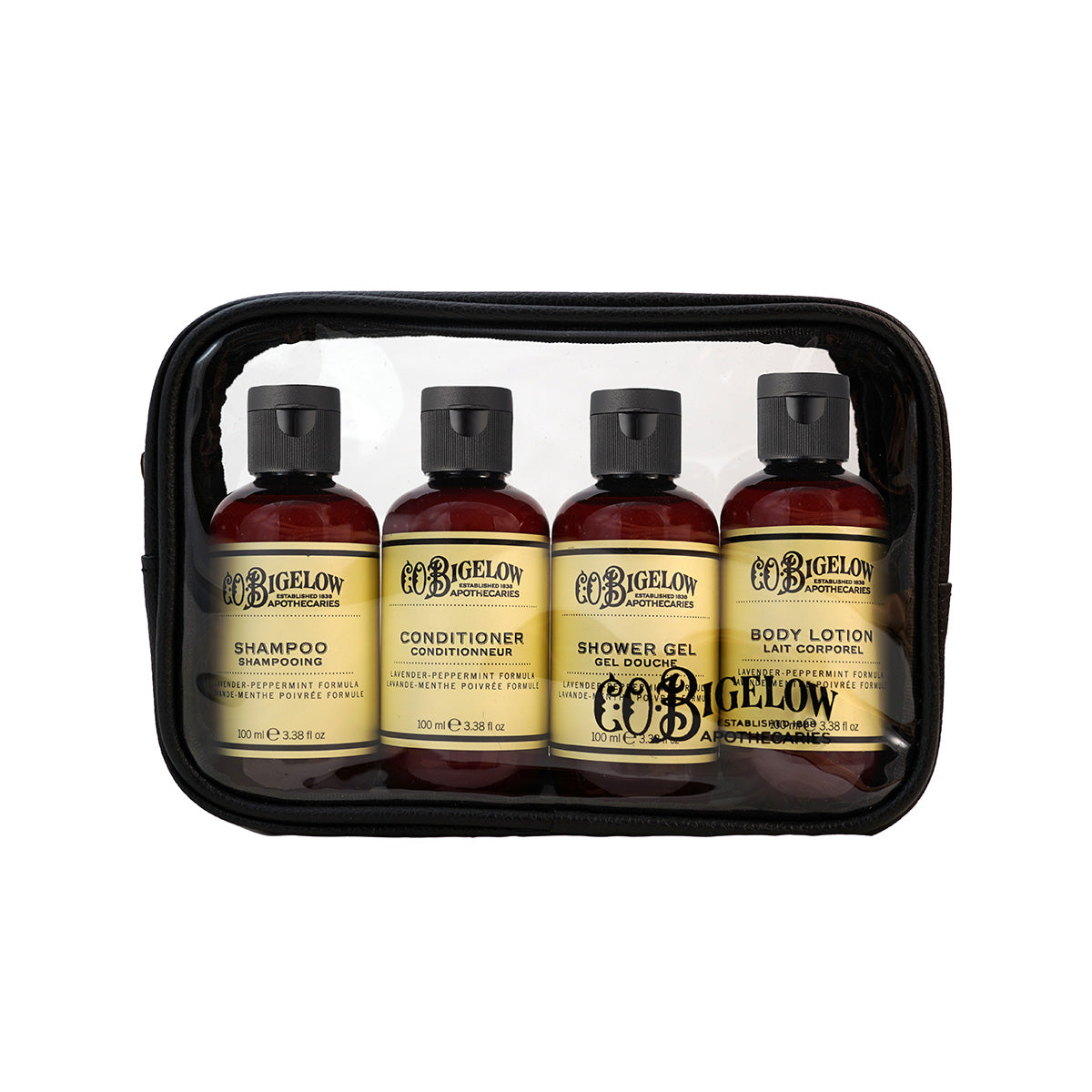 Set of four C.O. Bigelow Lavender Peppermint bottles in a black travel case on a white background