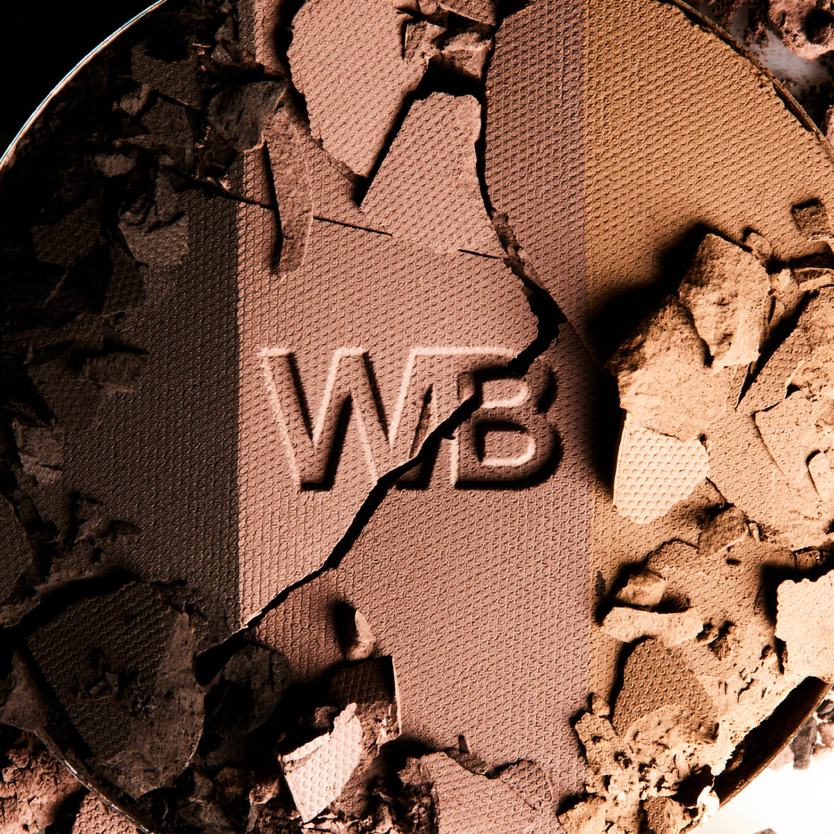 Closeup of a crumbled Wonderblush Le Regard Eye and Brow Pallet.