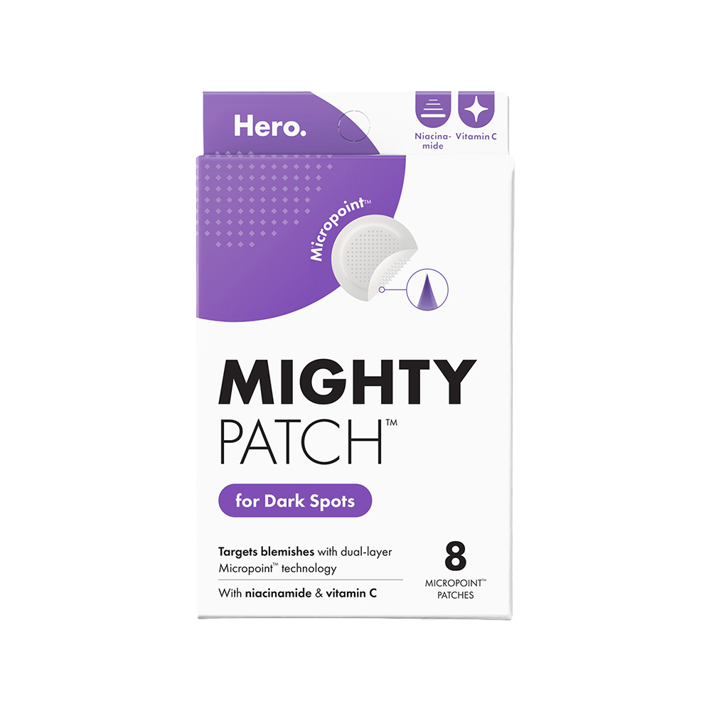 Mighty Patch packaging for dark spots with purple and white design on a white background