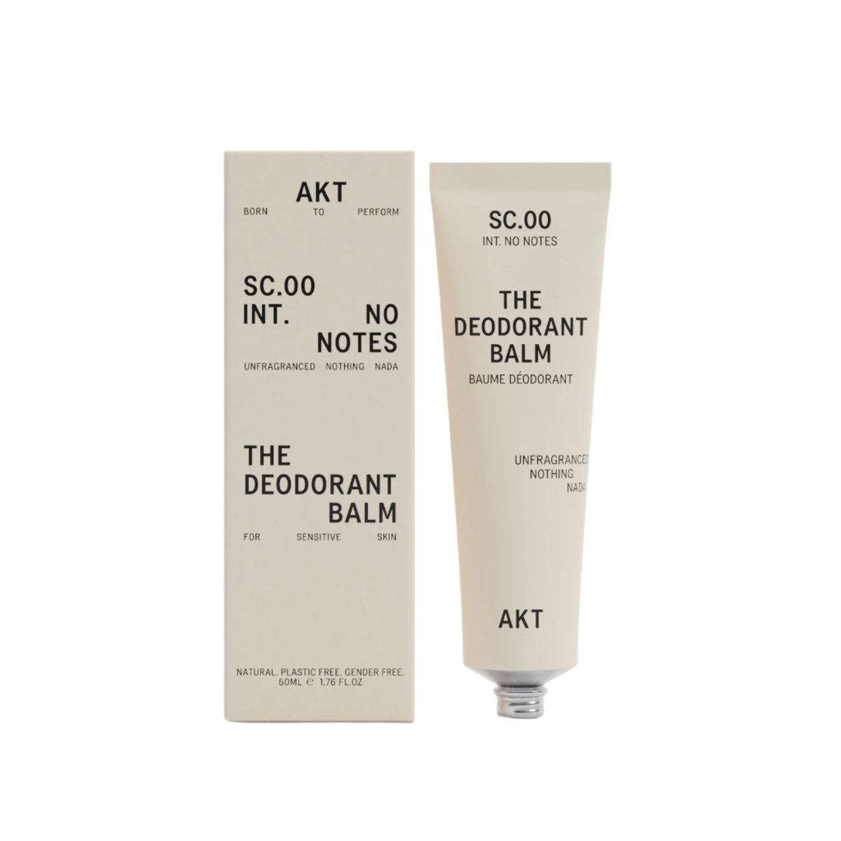AKT Unscented Deodorant Balm in tan tube next to tan product box on a white background. 