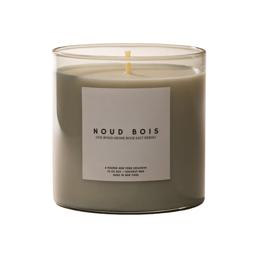 Candle with a label on a white background
