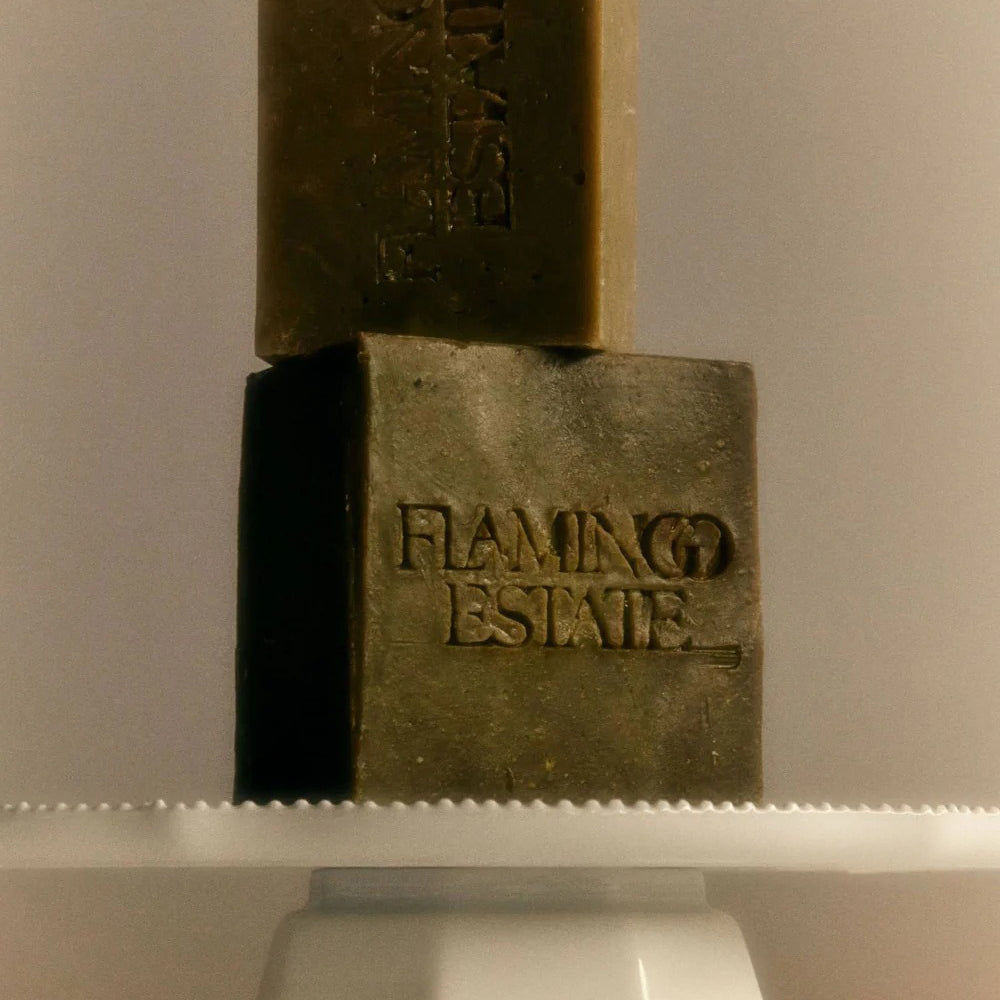 Rosemary Green soap bars with 'Flaming Estee' branding on a white surface.