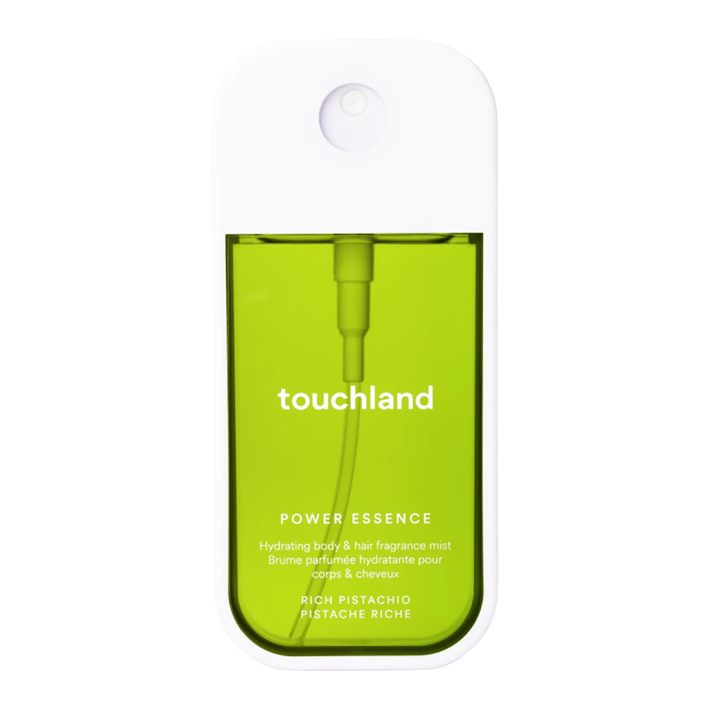 Green bottle of touchland power essence on a white background