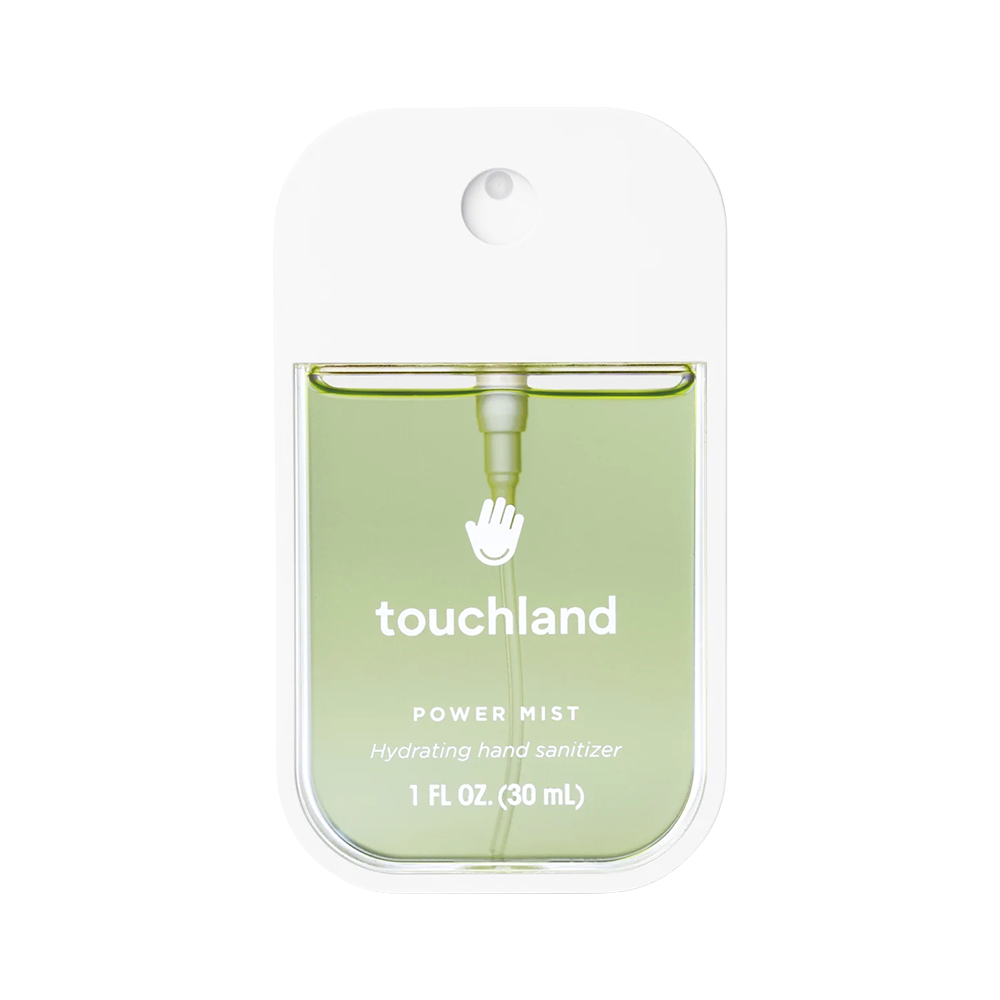Green hand sanitizer packaging with 'touchland' branding on a white background