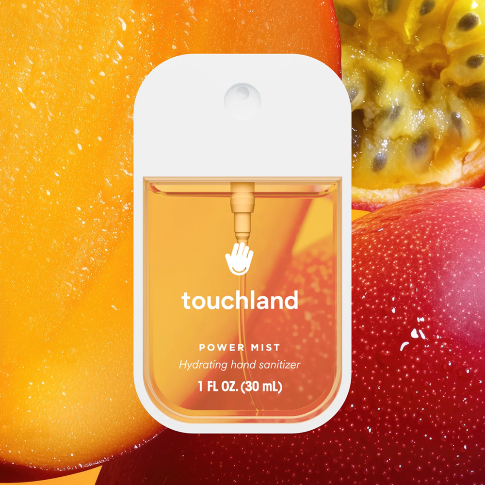 Touchland power mist hand sanitizer packaging with a fruit background