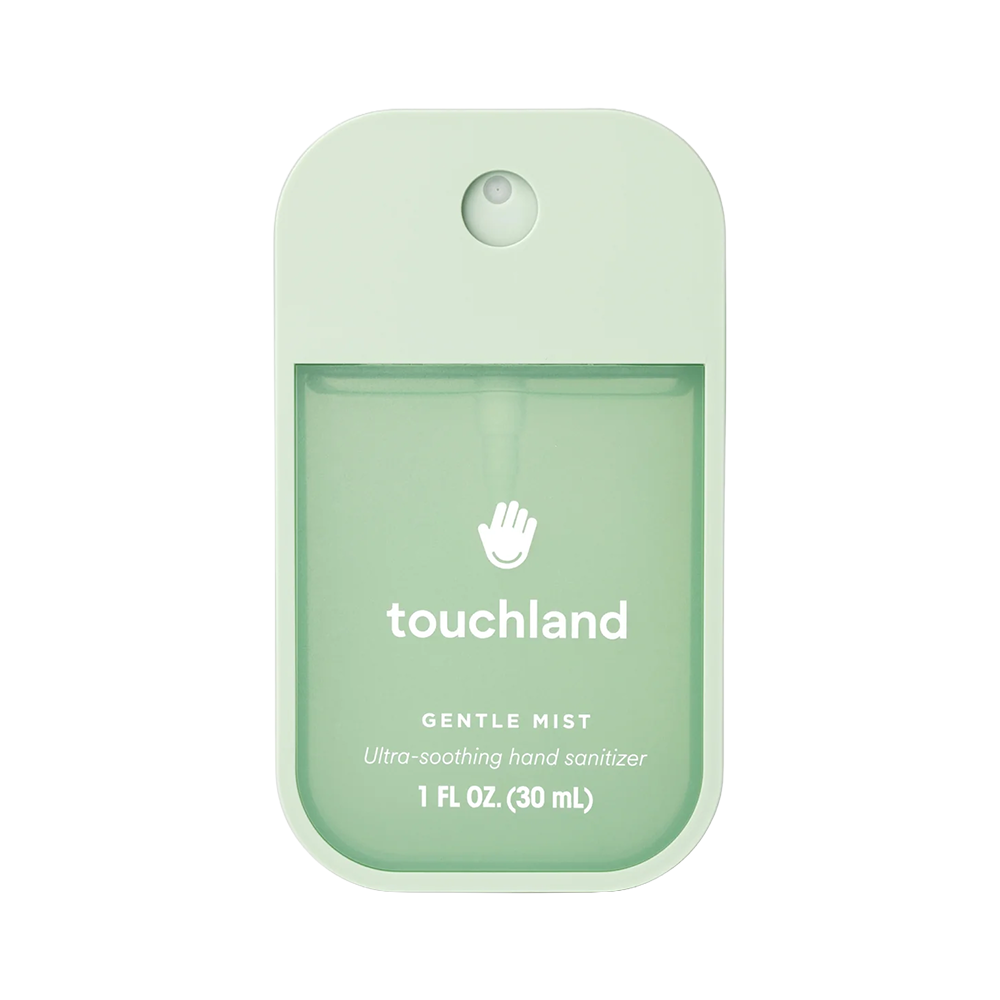 Green hand sanitizer packaging with 'touchland' branding on a white background