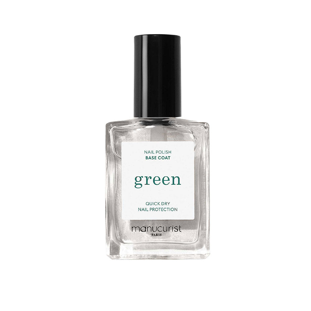 Bottle of The Manucurist's Quick Dry Base Coat in front of white background.