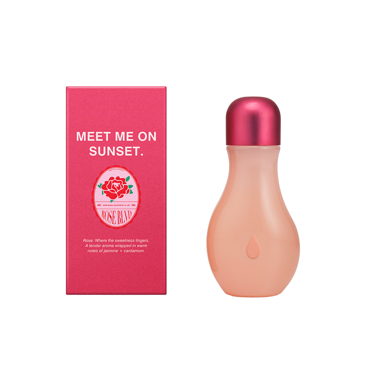 A bottle of One Way 'Meet Me On Sunset' perfume next to its pink packaging box, set against a plain white background.
