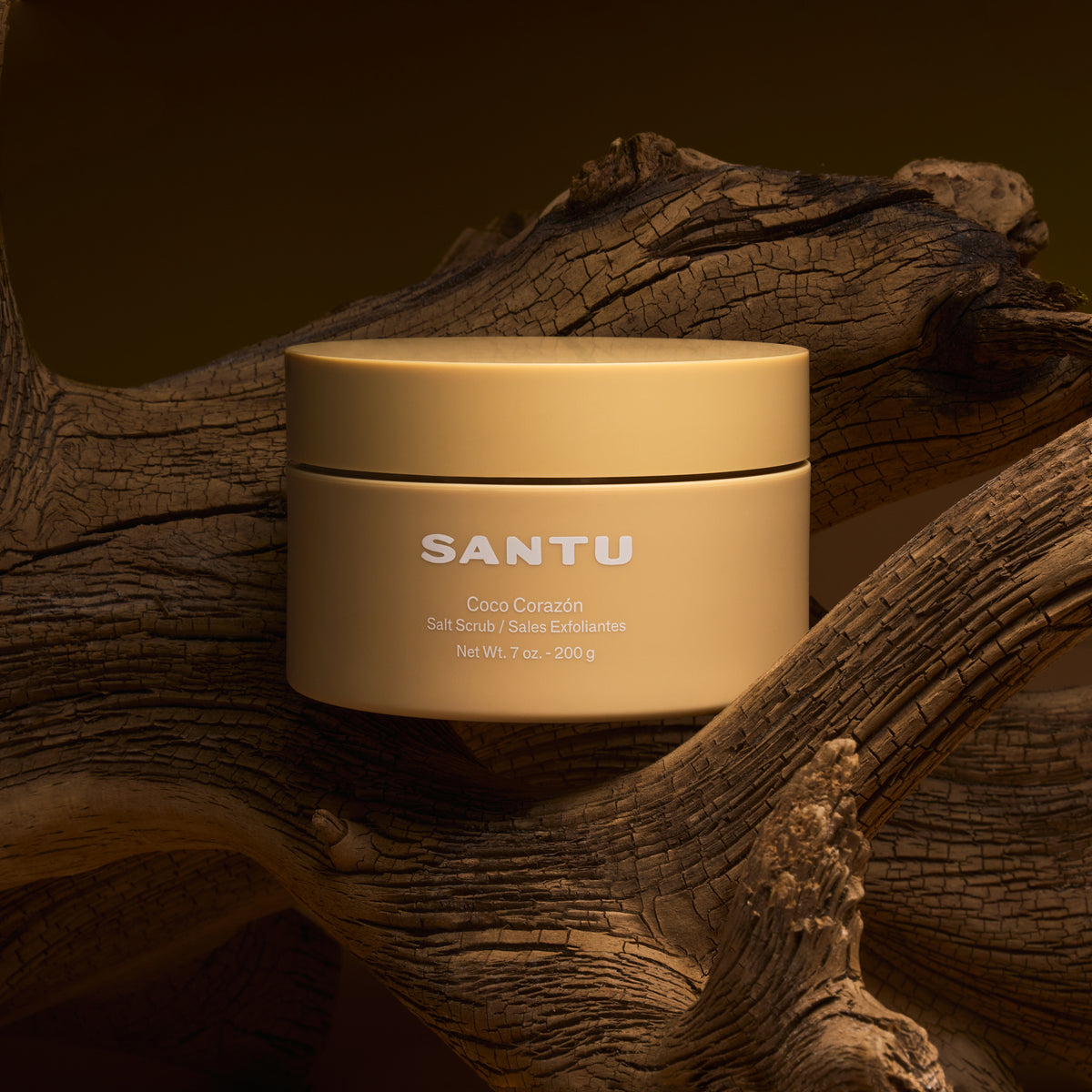 Beige jar labeled 'SANTU' on a wooden background