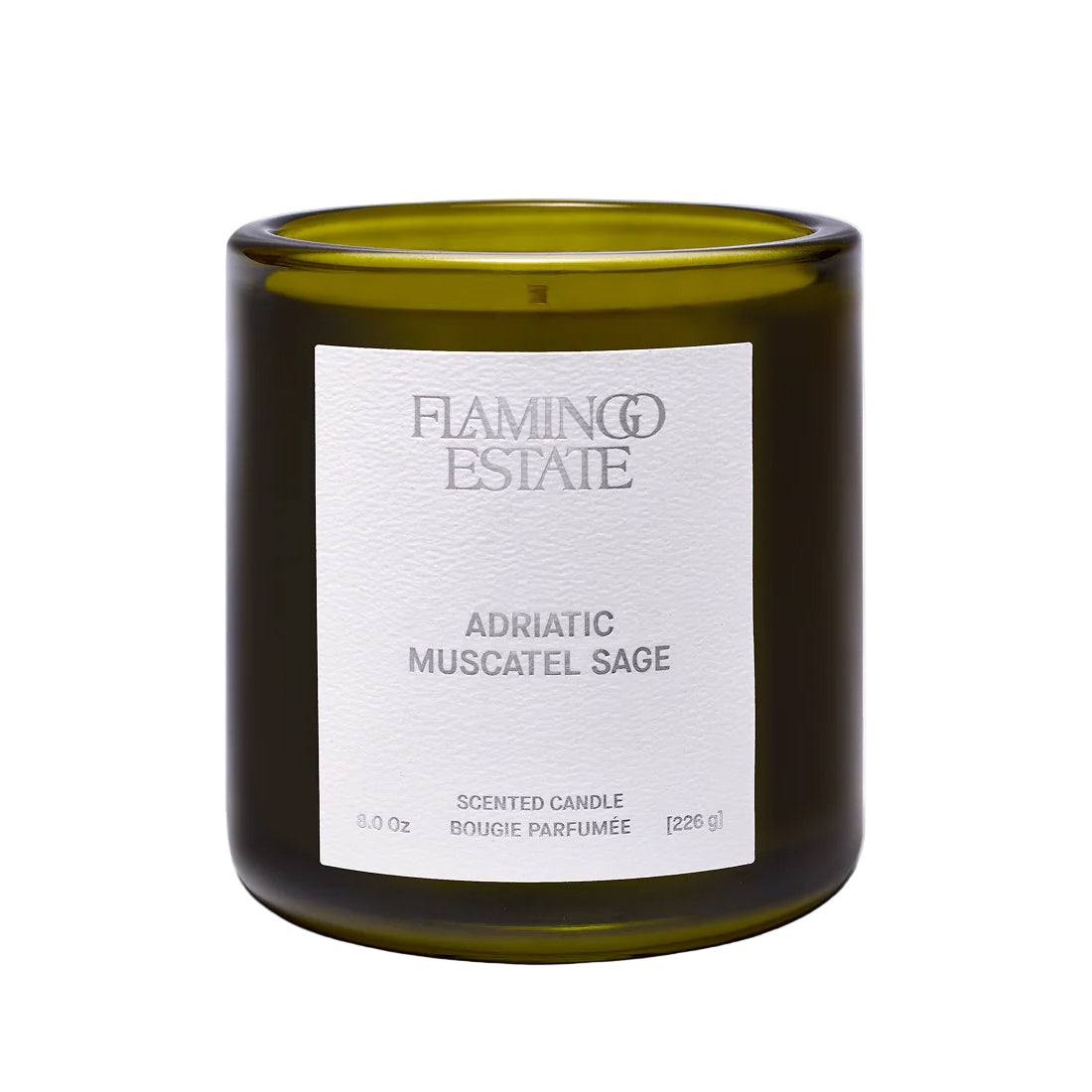 Flamingo Estate Adriatic Muscatel Sage Green candle with a white label on a white background