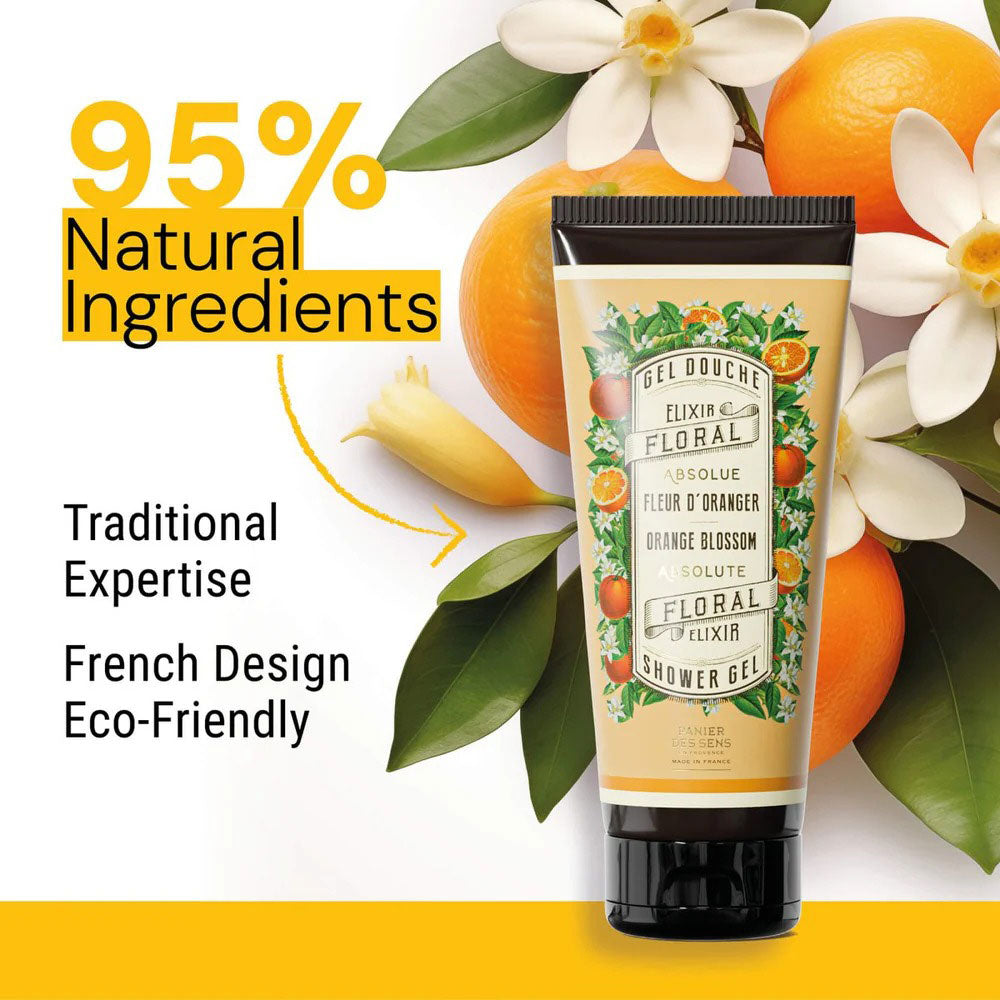 Panier des Sens Orange Blossom Shower Gel in front of oranges and orange blossoms. Text Reads: "95% Natural Ingredients. Traditional Expertise. French Design Eco-Friendly."