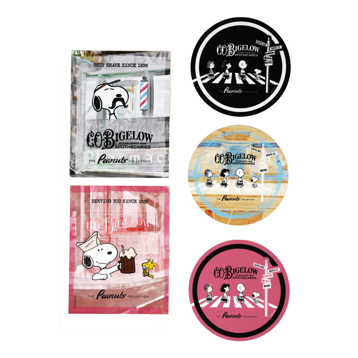 Four Co Bigelow x Peanuts Brand themed stickers in different color variations: black and white, beige and blue, pink and white, and pink and black. Each features cartoon illustrations of Snoopy and Woodstock with the Co Bigelow logo.