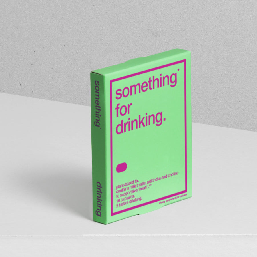 A green and pink package of 'something for drinking' containing dietary supplements for liver health.