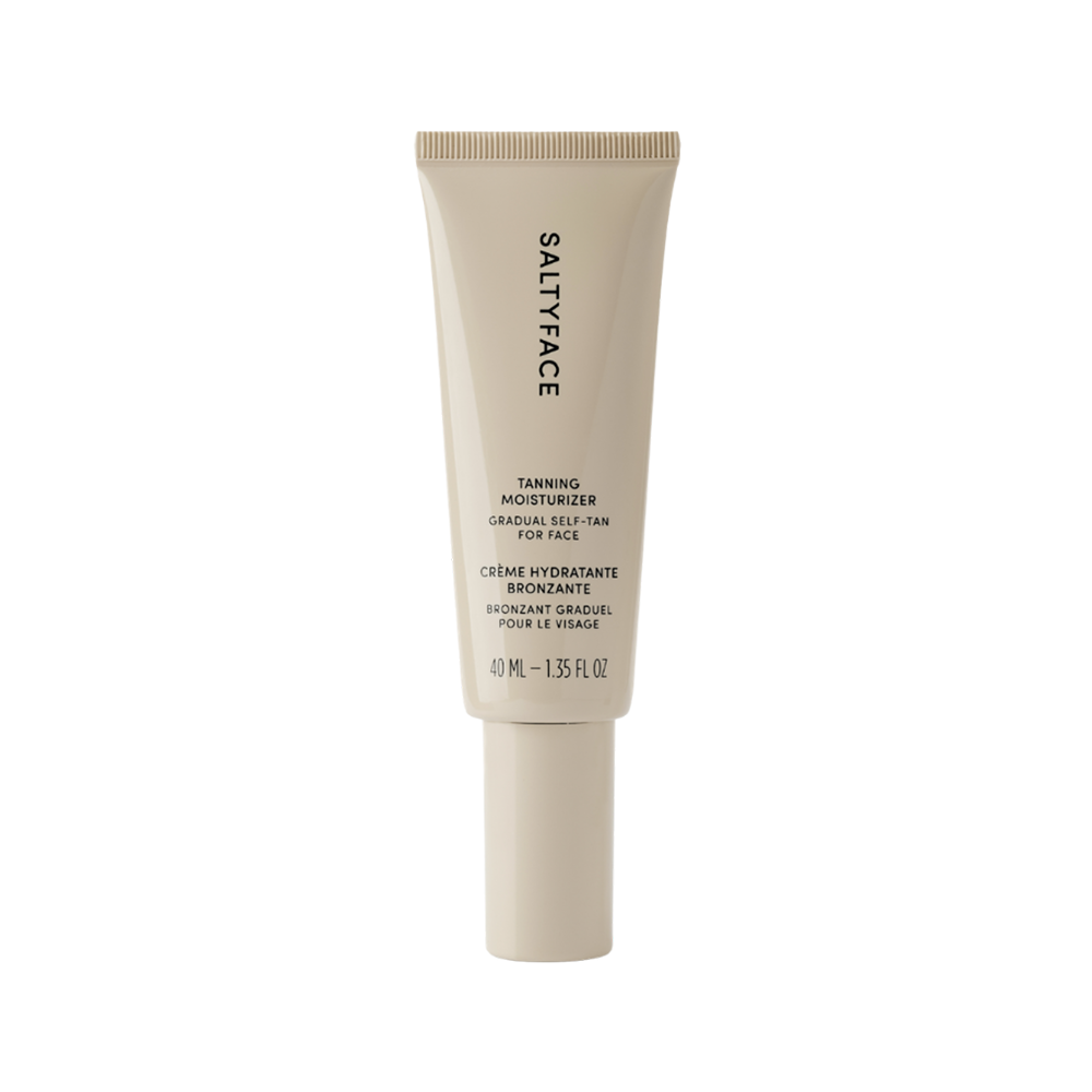 Tanning moisturizer tube with 'Salty Face' branding on a white background