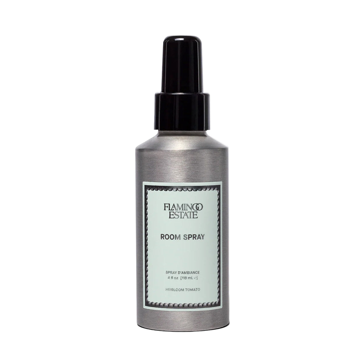Tomato room spray bottle with black cap and label on a white background